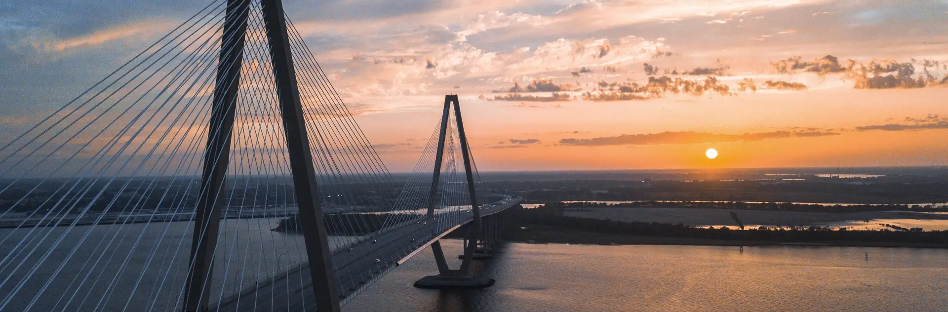 The Ravenel Bridge in Charleston at sunset.